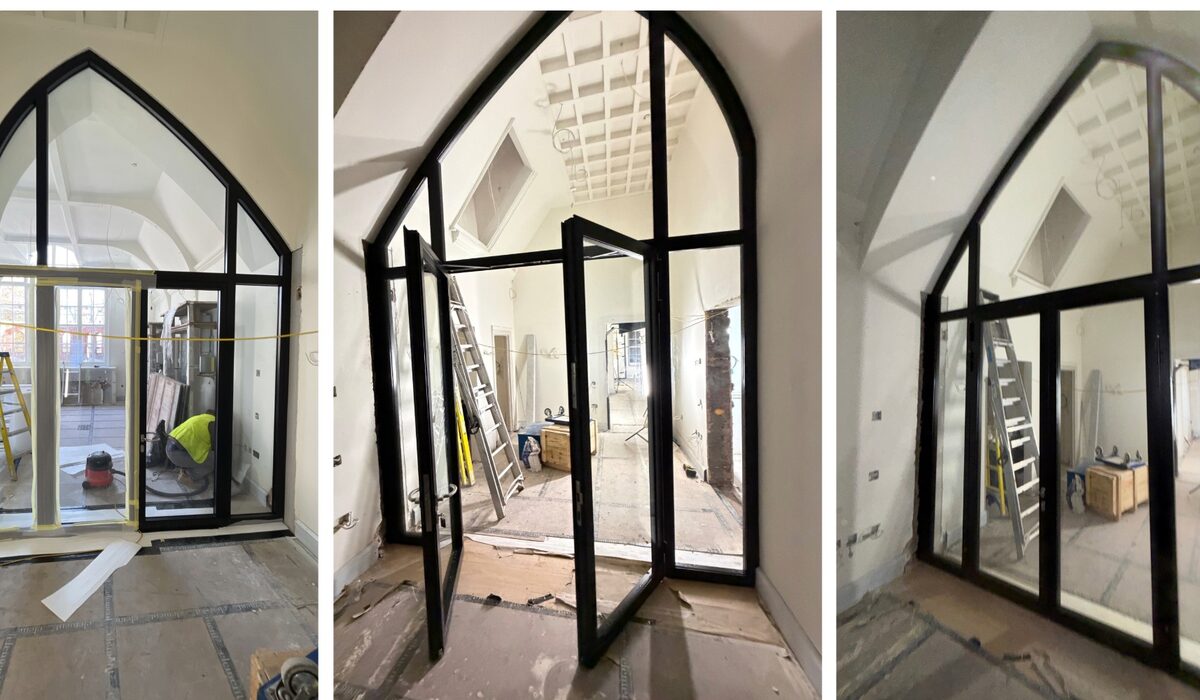site images of a pointed arched or gothic arched fire rated screen in a partially completed state