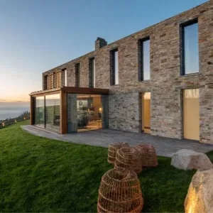 glass box extension to contemporary new build in Cornwall