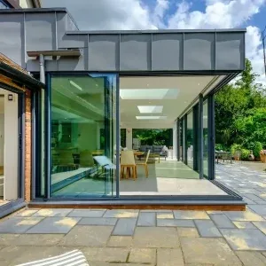 slim framed sliding glass doors in modern conservatory glass extension