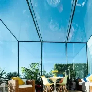 structural glass roof creating biophilic design in glass box extension