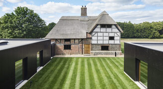 structural windows and slim sliding doors in this renovation project