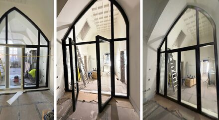 site images of a pointed arched or gothic arched fire rated screen in a partially completed state