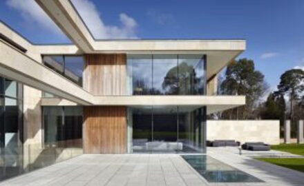 luxury new build home with minimal glass facade