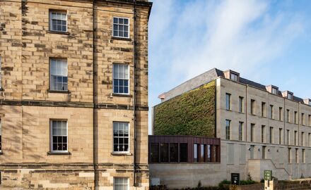 external view of glass link extension between old and new buildings at Bailiffgate hotel Alnwick