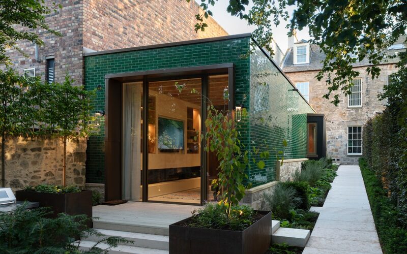Pivot Door at Twilight | Architectural Glazing in Edinburgh | Stockbridge Extension