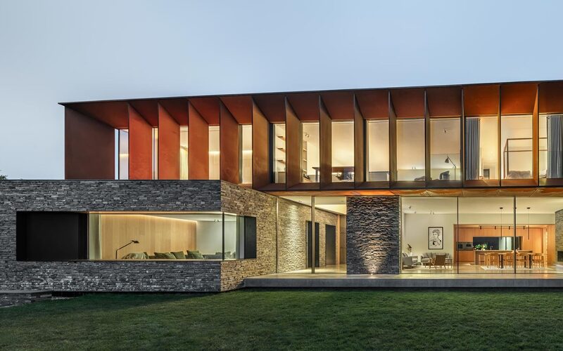 Garden View of Glazing Including Coastal Sliding Glass Doors in Wales at Porthmadog House