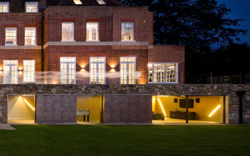 slim sliding glass doors to the lower ground floor of a renovation in totteridge
