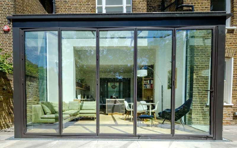 Ultra slim aluminium bifold doors - IQ Glass - South Hill Park