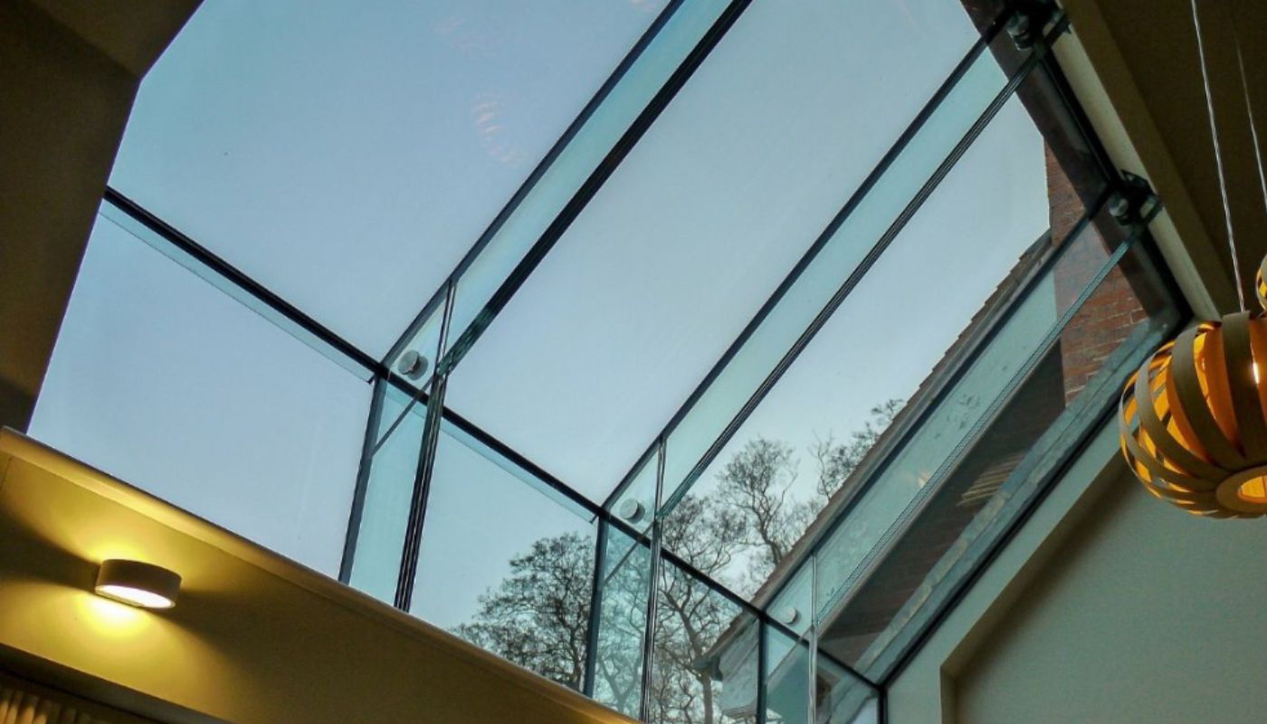 Houses that overlook a golf course - IQ Glass