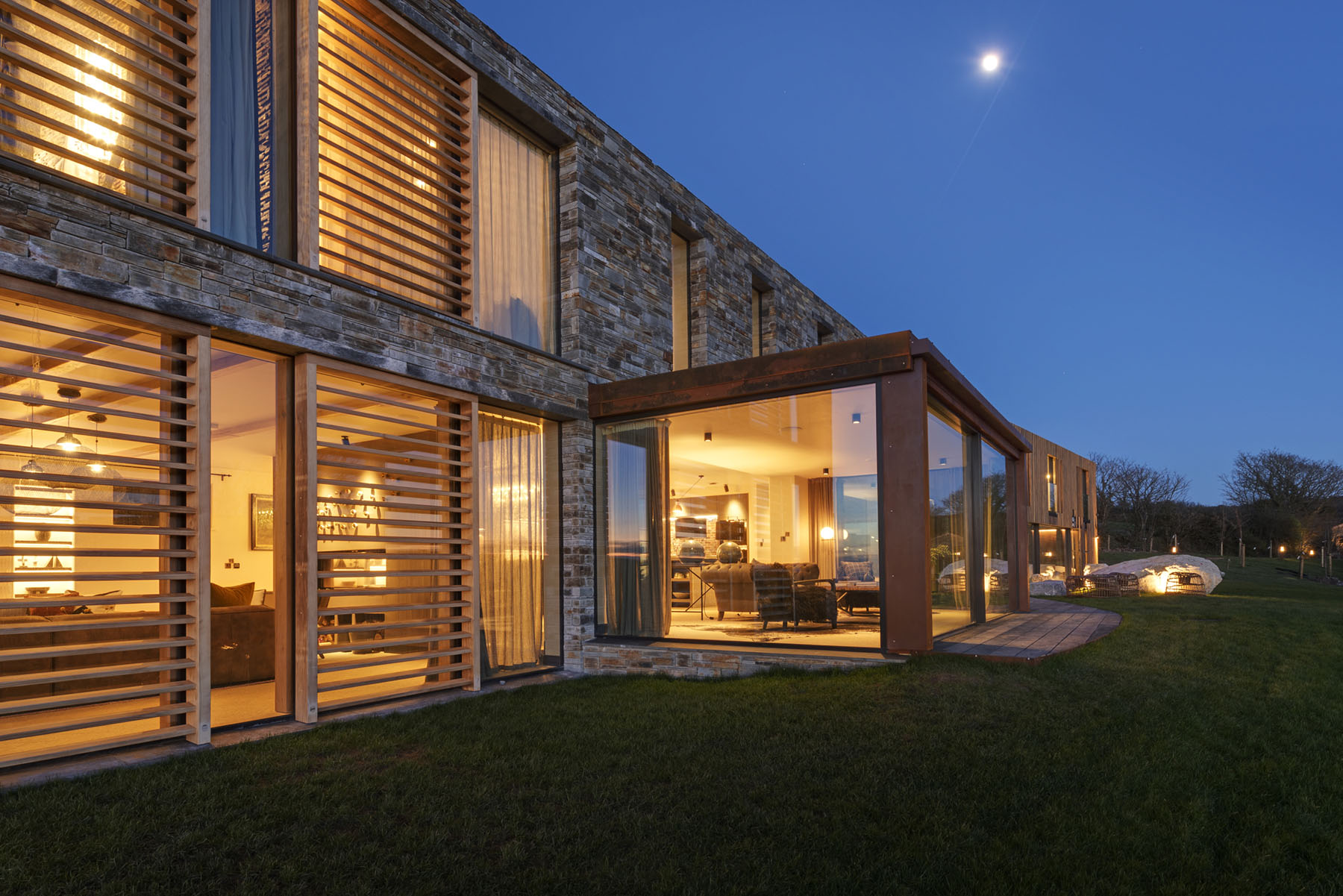 Structural glazing and slim sliding doors in North Wales - Stone Haven - IQ Glass